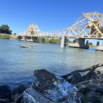 Chuy’s Tacos - a river with a bridge in the background - Mexican Near Me - Courtland, California