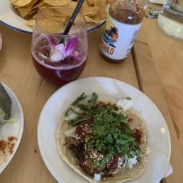 Barbacoa taco and red sangria