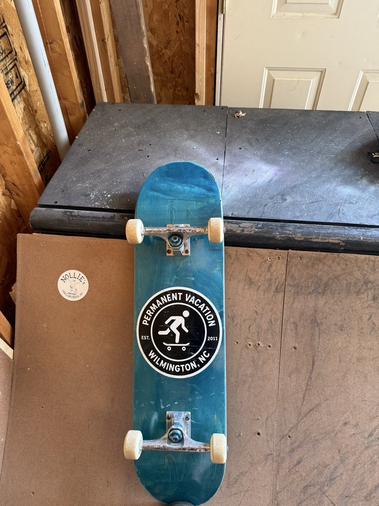 Permanent Vacation Skate and Surf shop Logo