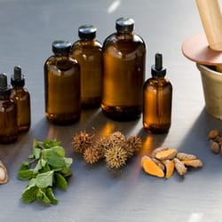 In Good Health - We have a full tincture pharmacy at the office. Pictured here: burdock root, mint, liquid amber seeds, tumeric and gardenia seeds (L to R).