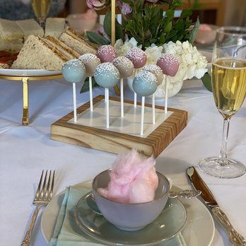 Genevieve Tea Services - Catering set up at each table. Proper cutlery, vintage opaque cups, peony flower arrangements and delicious food! - Caterers Near Me