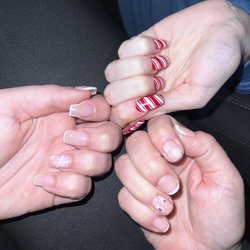 Nancy's Nail Spa - Bill- candy cane nails  Thu- snowflake and ornaments Katie- snowflake