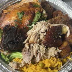 Banana Brasil - Fish, Chicken, Pernil, Beef ribs, Yellow rice, Broccoli, Plaintain.