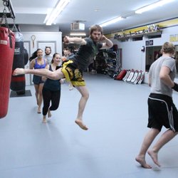 Martial Arts Unlimited Victoria - One of our crazy members having some fun during a warm-up. Take the training seriously, but not yourself...