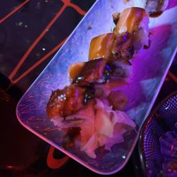 a plate of sushi on a table a plate of sushi on a table
