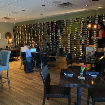 The Cellar - a wine tasting room with tables and chairs - Wine Bars Near Me - Ahwatukee, Arizona