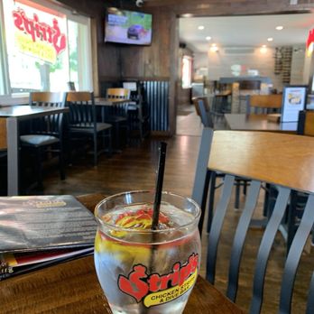 Strip's Chicken - Seating and looking forward to the entrance and the bar - Breweries Near Me - Lenexa, Kansas Strip's Chicken - Seating and looking forward to the entrance and the bar - Breweries Near Me - Lenexa, Kansas