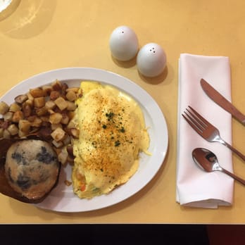 Wild Eggs - Creole omelet: Rock shrimp, andouille, pepper, onion, creole hollandaise. Blueberry muffin. Potatoes. - Breakfast & Brunch Near Me - Indianapolis, Indiana Wild Eggs - Creole omelet: Rock shrimp, andouille, pepper, onion, creole hollandaise. Blueberry muffin. Potatoes. - Breakfast & Brunch Near Me - Indianapolis, Indiana