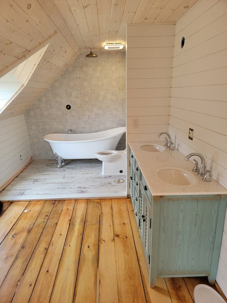 Slide of AT Plumbing Services