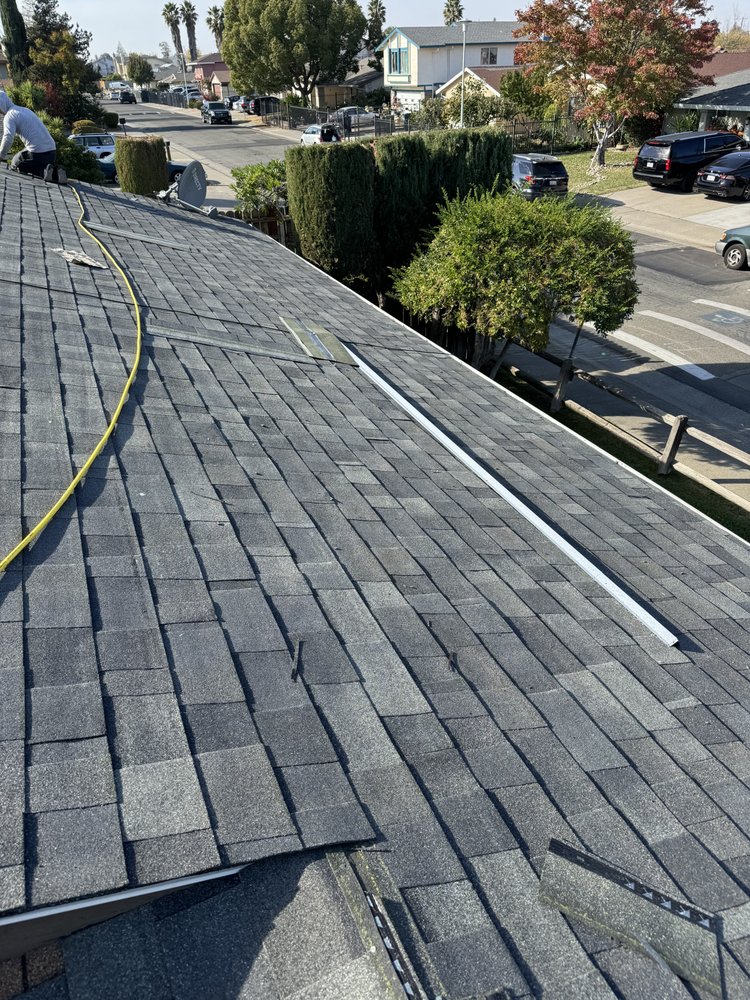 Slide of LXS Roofing