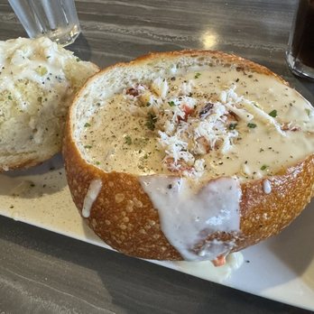 The Fish Hopper - Clan Chowder in a bread bowl with Crab on top - Seafood Near Me - Monterey, California The Fish Hopper - Clan Chowder in a bread bowl with Crab on top - Seafood Near Me - Monterey, California