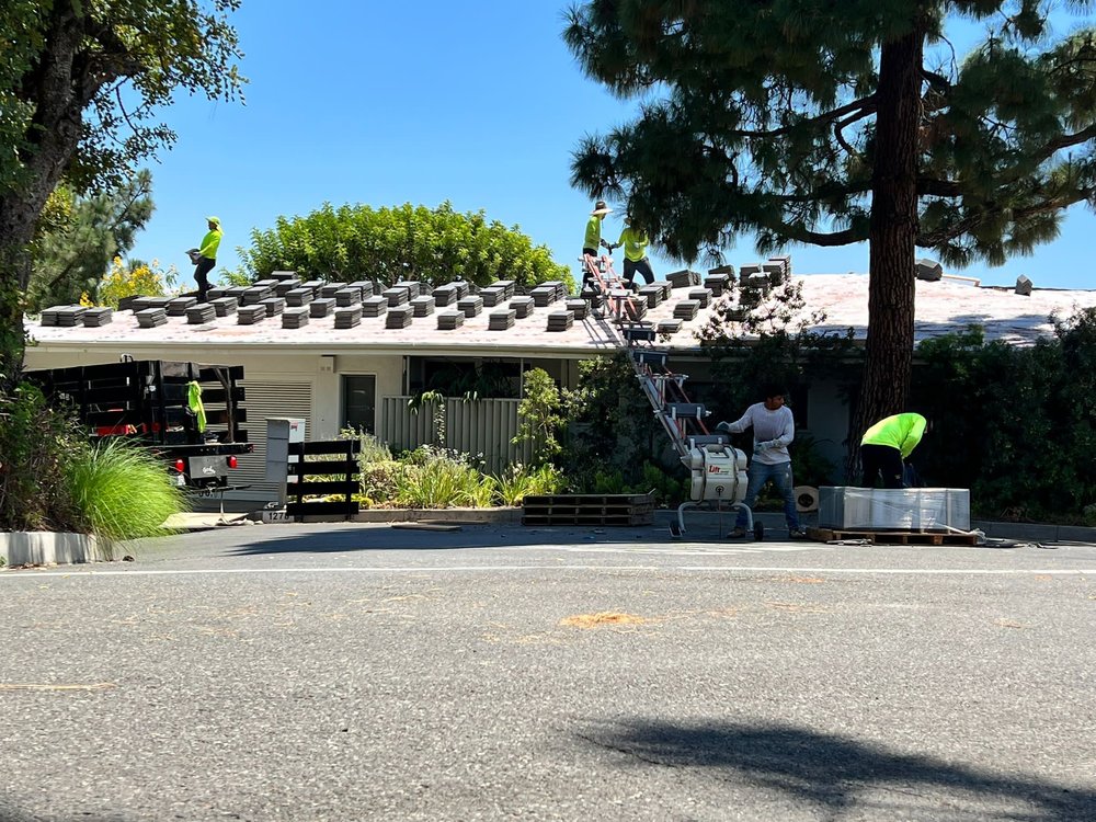 Slide of United Frontier Roofing