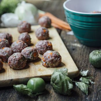 Meat the Butchers - a cutting board with meatballs on it - Butcher Near Me - Vernon, California Meat the Butchers - a cutting board with meatballs on it - Butcher Near Me - Vernon, California