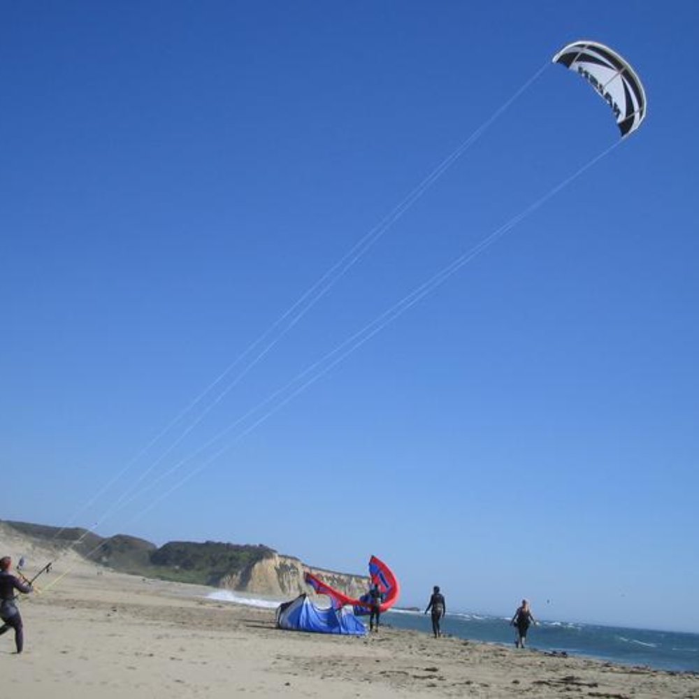 Scott Creek Beach - Kite surfer getting ready to go out. - Beaches Near Me - Davenport, California