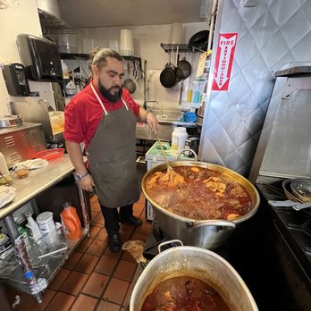El Taller De La Barbacoa - El Taller owner, Chad, tending to his amazing birria. - Mexican Near Me - Spring Valley, California El Taller De La Barbacoa - El Taller owner, Chad, tending to his amazing birria. - Mexican Near Me - Spring Valley, California