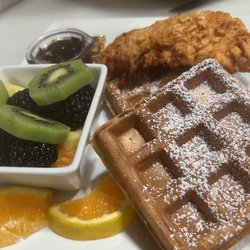 That Brunch Place - Chicken & waffles with fresh fruit.