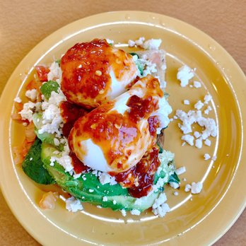 Oak Diner - Avocado Toast w/ an extra poached egg: sliced avocado, Feta crumbles and a Sambal Oelek chili sauce - PERFECTION! - Diners Near Me - Royal Oak, Michigan Oak Diner - Avocado Toast w/ an extra poached egg: sliced avocado, Feta crumbles and a Sambal Oelek chili sauce - PERFECTION! - Diners Near Me - Royal Oak, Michigan