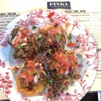 FINKA Table & Tap - Tostones with vaca frita on top - Asian Fusion Near Me - Miami, Florida FINKA Table & Tap - Tostones with vaca frita on top - Asian Fusion Near Me - Miami, Florida