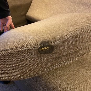 Inn at Otter Crest - Couch cushion with burn mark - Hotels Near Me - Otter Rock, Oregon