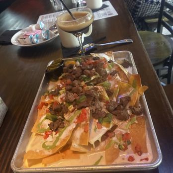 Pour Behavior - Texas-Sized Nachos - Cocktail Bars Near Me - Houston, Texas Pour Behavior - Texas-Sized Nachos - Cocktail Bars Near Me - Houston, Texas