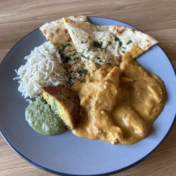 Indian Curry and Grill - Rice, naan, aloo tikki (crispy potato patty), and butter chicken (slightly too sweet) - Indian Near Me - Lodi, California Indian Curry and Grill - Rice, naan, aloo tikki (crispy potato patty), and butter chicken (slightly too sweet) - Indian Near Me - Lodi, California