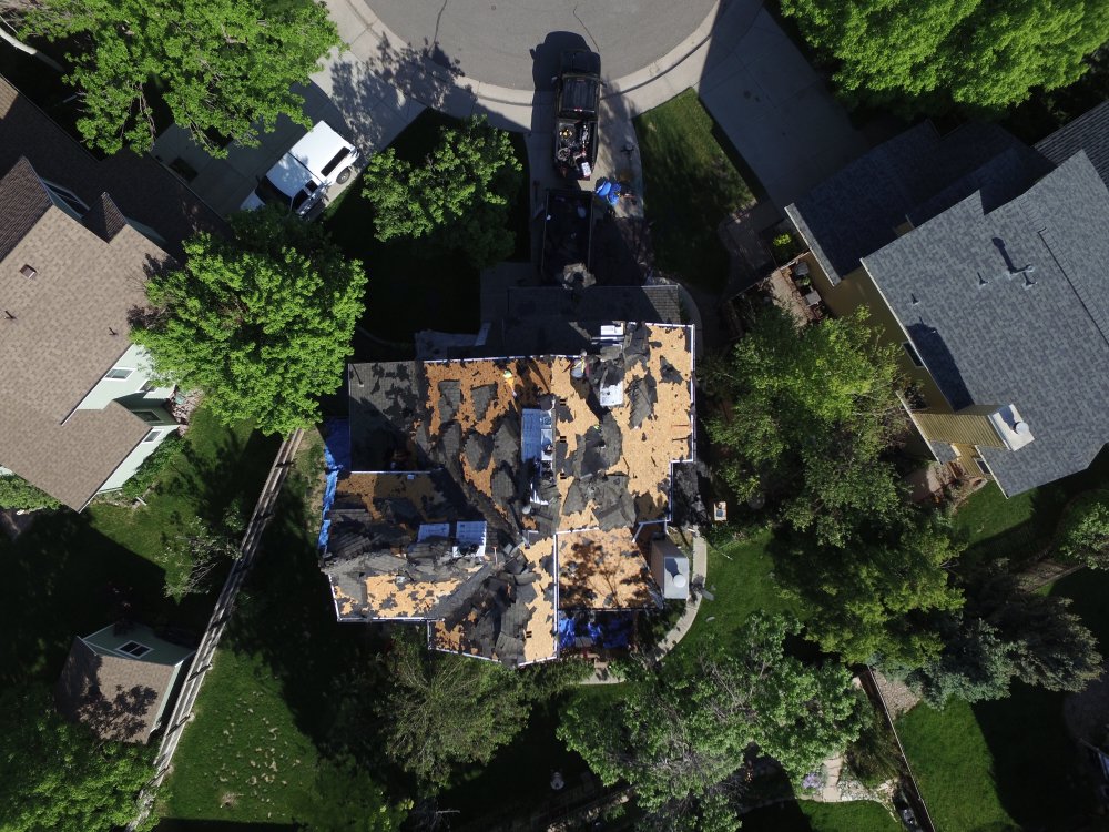 Slide of In-Ex Designs Roofing