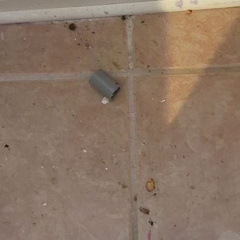 Prime Serve - Trash and a stained wall left by the electrician. A trash can is 2 ft from this location. - Electricians Near Me - Arlington Heights, Illinois