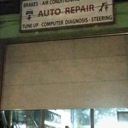 King Automotive - Accessible only via the narrow driveway immediately west of Strachan (behind A&A Garage)