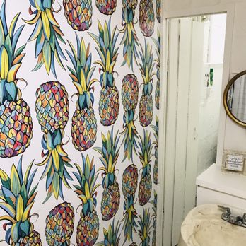 Kiki's Health Cafe - Adorable bathroom with pineapple wallpaper - Acai Bowls Near Me - Evergreen, Colorado