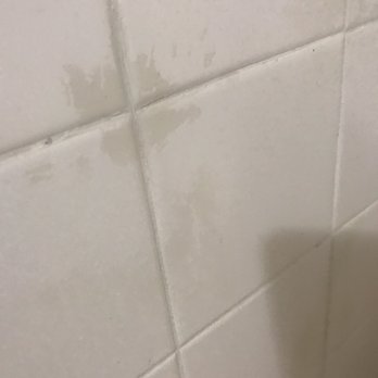 Prestige Resurfacing - Before: Discolored/stained wall tiles - Refinishing Services Near Me - Atlanta, Georgia