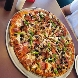 Their version of a Supreme pizza. Their version of a Supreme pizza.