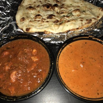 Vindaloo Indian Cuisine - Chicken Vindaloo (left) Butter Chicken (right) Garlic Naan (top) - Indian Near Me - Toronto, Ontario