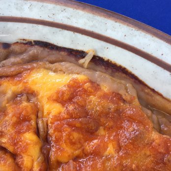 Moreno's - Not tasty at all enchilada with overheated microwave beans. - Mexican Near Me - Orange, California Moreno's - Not tasty at all enchilada with overheated microwave beans. - Mexican Near Me - Orange, California
