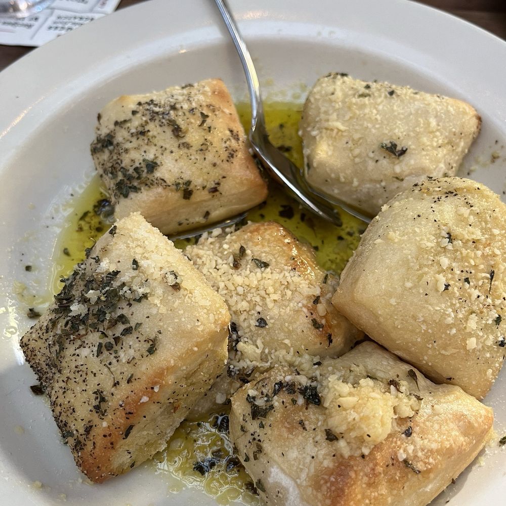 Tomatina - Tomatina's Signature Garlic Rolls - Italian Near Me - Alameda, California Tomatina - Tomatina's Signature Garlic Rolls - Italian Near Me - Alameda, California