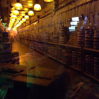 Yard House - I don't drink, but that's a rediculous amount of beer. Both sides of the long walls are covered from end to end. - New American Near Me - Irvine, California Yard House - I don't drink, but that's a rediculous amount of beer. Both sides of the long walls are covered from end to end. - New American Near Me - Irvine, California