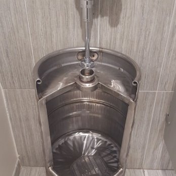 Doc's Commerce Smokehouse - The mens room features this. - Barbeque Near Me - Milwaukee, Wisconsin