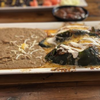 Mojave Cantina - Chile Rellenos with shredded beef-fantastic! Side of beans. - Mexican Near Me - South Lyon, Michigan Mojave Cantina - Chile Rellenos with shredded beef-fantastic! Side of beans. - Mexican Near Me - South Lyon, Michigan