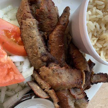 Hub's Restaurant - a plate of meat, rice, tomatoes, and a salad - Barbeque Near Me - Skokie, Illinois Hub's Restaurant - a plate of meat, rice, tomatoes, and a salad - Barbeque Near Me - Skokie, Illinois