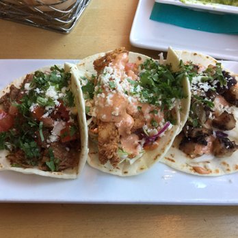 Holy Taco - From left to right: tri tip taco, dirty bird taco, and jerk chicken taco. - Mexican Near Me - Lake Oswego, Oregon Holy Taco - From left to right: tri tip taco, dirty bird taco, and jerk chicken taco. - Mexican Near Me - Lake Oswego, Oregon