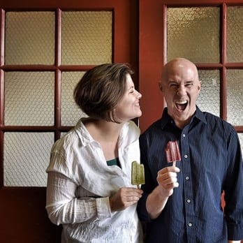 Crooked Stick Pops - a man and a woman standing next to each other - Desserts Near Me