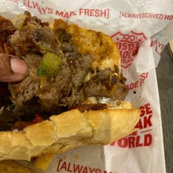Charleys Cheesesteaks - Burnt pieces from grill on the meat!