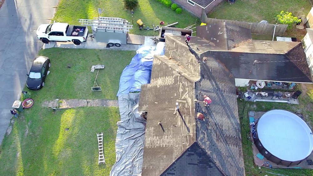 Slide of Palma's Roofing Experts