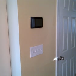 CAV Installations - On-wall touchscreen that controls audio and thermostat