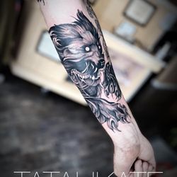 Skin City Tattoo and Body Piercing - Wolf
