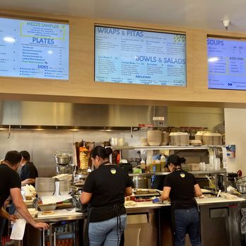 Tahina - people working in a restaurant kitchen - Mediterranean Near Me - Alameda, California