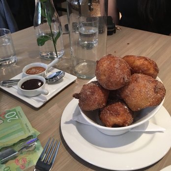 Klein Harris - Donuts with chocolate and salted caramel sauce. Super yummy! - Desserts Near Me - Calgary, Alberta