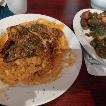 Patio 44 - Biloxi - Catfish and grits, came with sausage which wasn't mentioned in description... side of brussel sprouts - Steakhouses Near Me - Biloxi, Mississippi