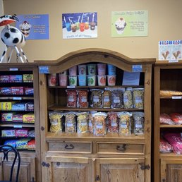 Popcorn, candy and mech! They also have a cooler for pop, candy at the register and frozen treats in the freezer!