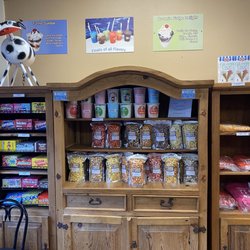 Two Scoops - Popcorn, candy and mech! They also have a cooler for pop, candy at the register and frozen treats in the freezer!