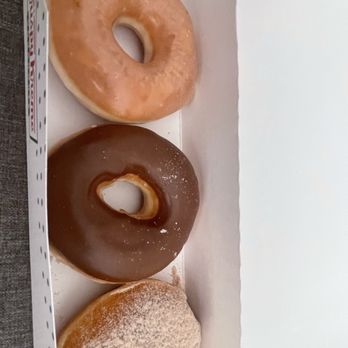 Krispy Kreme - 3 pack assorted with 1 classic glazed, 1 chocolate coated and one filled cinnamon and apple. - Donuts Near Me - Long Beach, California Krispy Kreme - 3 pack assorted with 1 classic glazed, 1 chocolate coated and one filled cinnamon and apple. - Donuts Near Me - Long Beach, California